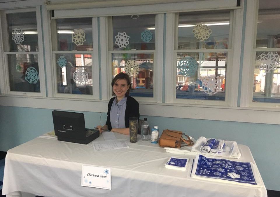 Our very own Emily Wood working the front desk at the holiday boutique!
